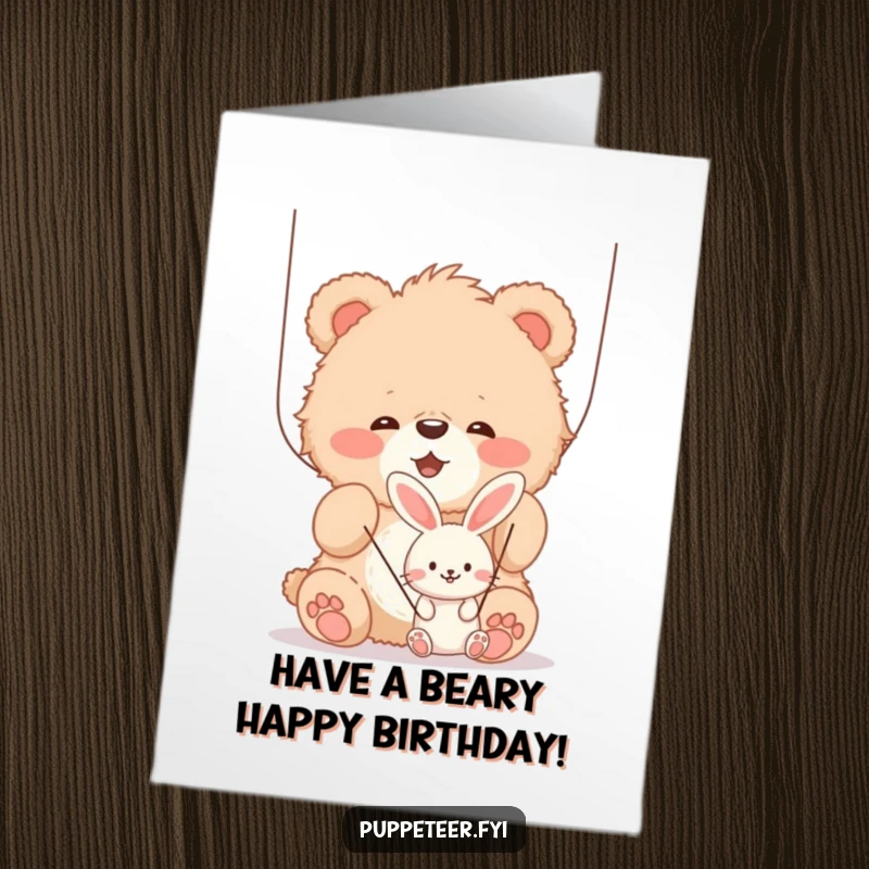 Funny Free Printable Birthday Card: A happy bear cub playing with strings attached to a smiling bunny puppet.